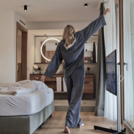 Woman dancing in the hotel room