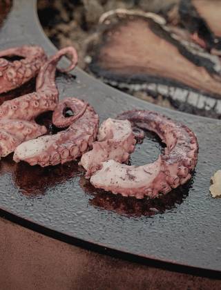 Seafood over an open fire on the grill