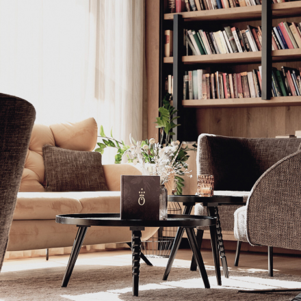 Hotel lobby with library and lounge at the HOCHKÖNIGIN in Salzburger Land