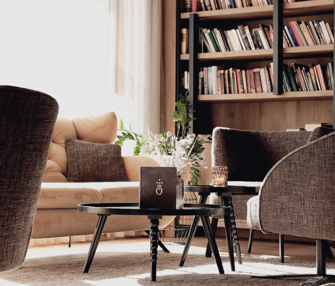 Hotellobby mit Bücherei und Lounge in der HOCHKÖNIGIN im Salzburger Land