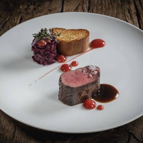 The finest of local game beautifully arranged on a plate in the HOCHKÖNIGIN