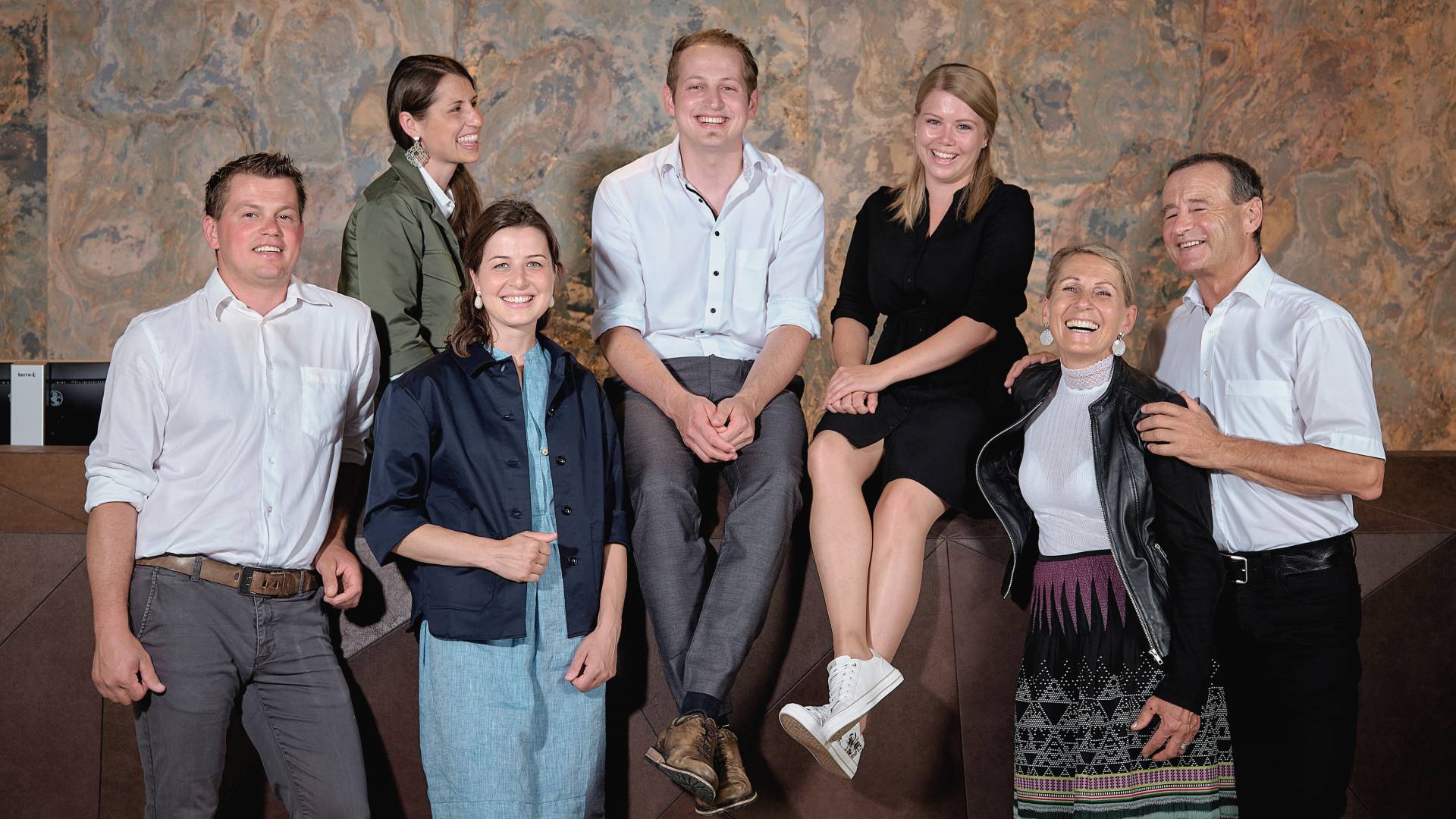 The Hörl family in the atrium at the HOCHKÖNIGIN in Maria Alm