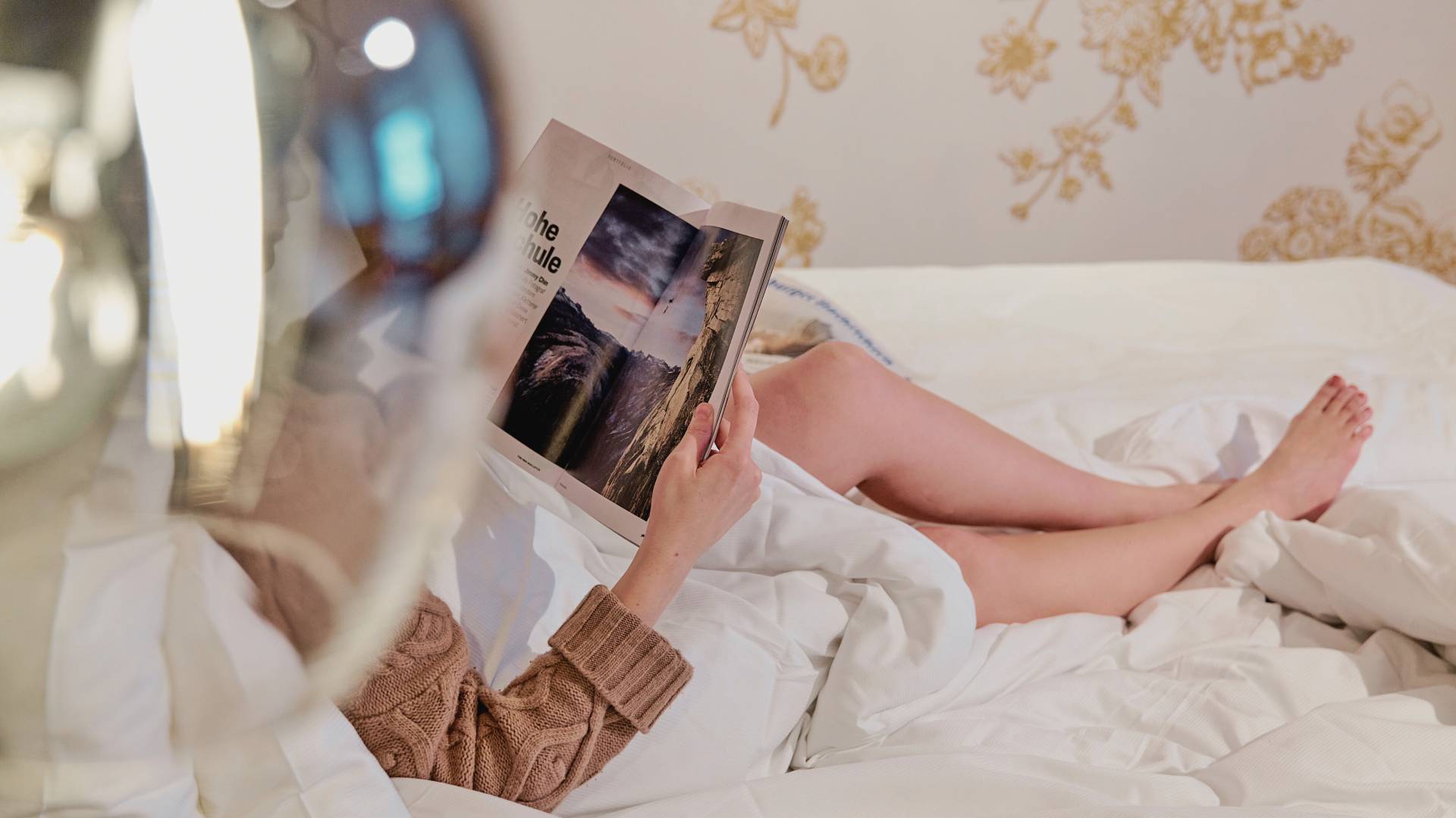 Reading in the hotel bed of the HIGH QUEEN