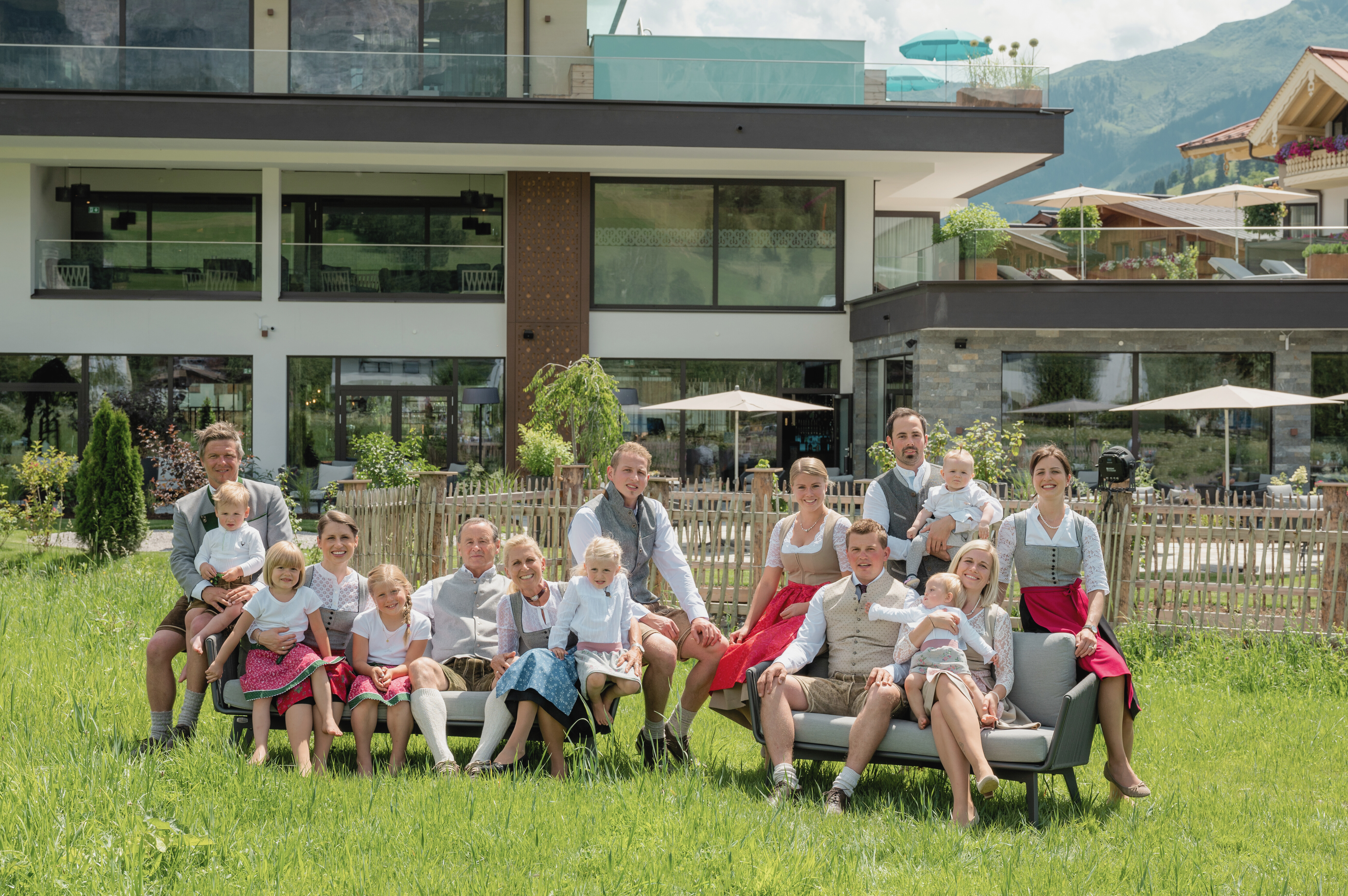 Family group picture in front of the hotel in summer